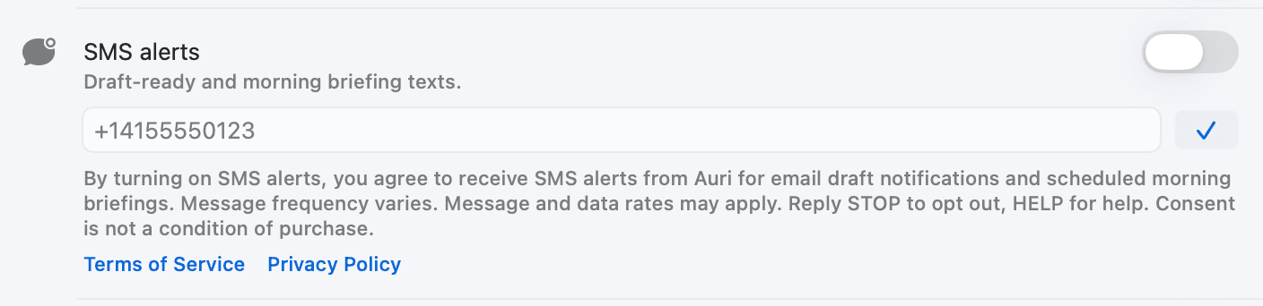 Auri SMS alerts settings screen showing optional SMS opt-in copy, phone number entry, and Terms and Privacy links